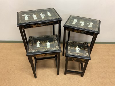 Lot 656 - A next of four lacquered occasional tables.