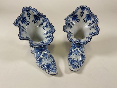 Lot 465 - A pair of Dutch Delft shoes with elborate...