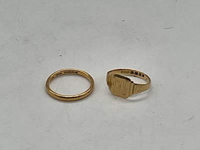 Lot 1248 - A 22ct yellow gold wedding band, size R,...