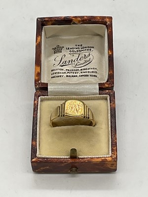 Lot 1249 - An 18ct yellow gold signet ring engraved with...