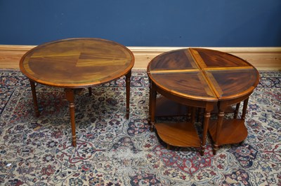 Lot 1129 - A reproduction mahogany circular coffee table...