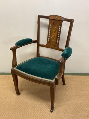 Lot 719 - An Edwardian mahogany inlaid elbow chair.