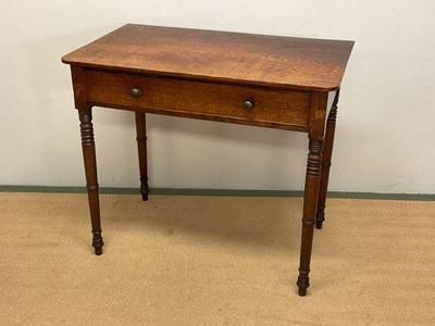 Lot 673 - A late George III oak single drawer side table,...