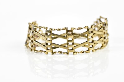 Lot 299 - A 9ct gold gate link bracelet with padlock...