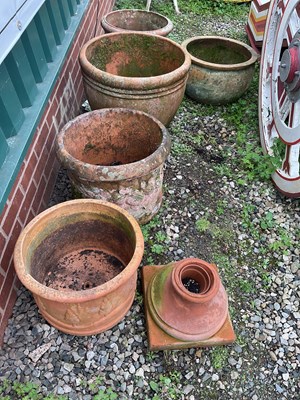 Lot 588 - A quantity of terracotta garden pots,...