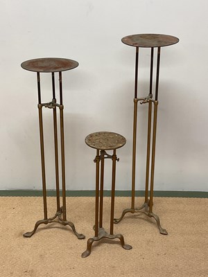 Lot 432 - Three Art Nouveau adjustable brass shop...