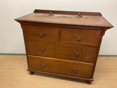 Lot 670 - An early 20th century stained pine chest of...