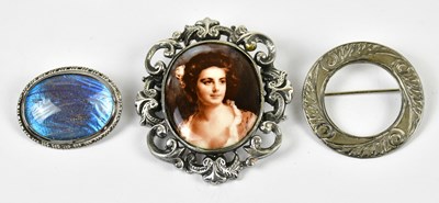 Lot 555 - Two sterling silver brooches, one with a...
