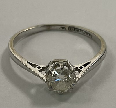 Lot 1137 - An 18ct white gold diamond solitaire ring, the...