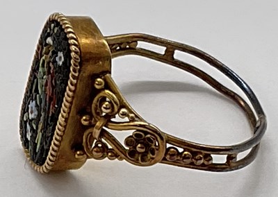 Lot 1140 - A yellow metal micromosiac ring with pierced...