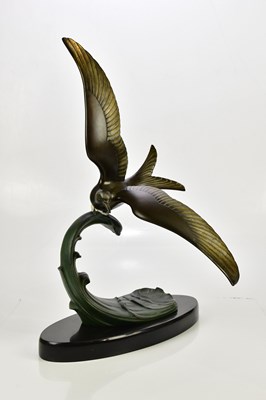 Lot 2082 - ROCHARD; an Art Deco spelter gull on a wave,...