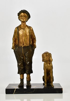 Lot 2077 - An Art Deco bronzed spelter group of a boy and...