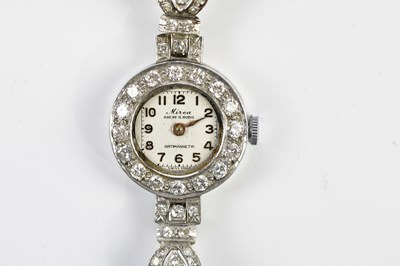 Lot 586 - MIRCA; a lady's Art Deco platinum wristwatch...