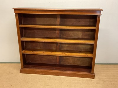 Lot 665 - A mahogany open bookcase with three adjustable...