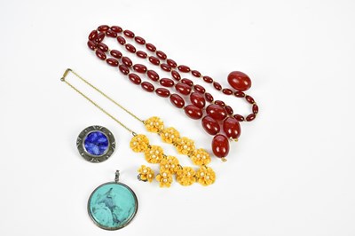 Lot 507 - A string of hand tied cherry amber graduated...