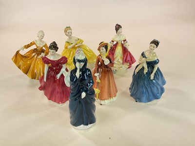 Lot 492 - ROYAL DOULTON; a group of seven figures...