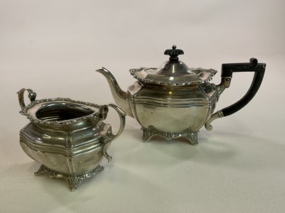 Lot 1016 - An Edwardian hallmarked silver teapot and...