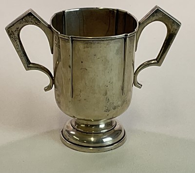 Lot 1017 - A George V hallmarked silver twin handled...