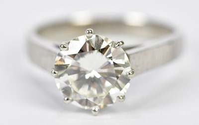 Lot 28 - A platinum diamond solitaire ring, the eight...