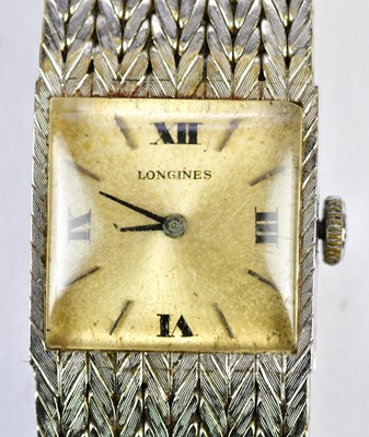 Lot 579 - LONGINES; a lady's 18ct white gold wristwatch,...