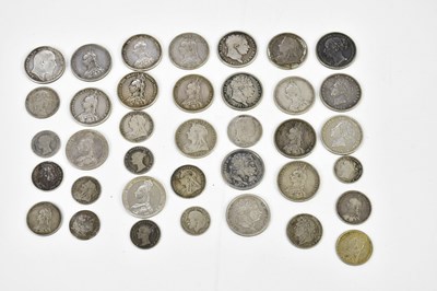 Lot 2578 - A collection of twenty-one silver shillings,...