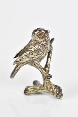 Lot 2182 - A hallmarked silver figure of a bird,...