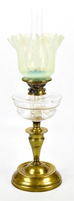 Lot 1553 - A Victorian brass oil lamp, with vaseline...