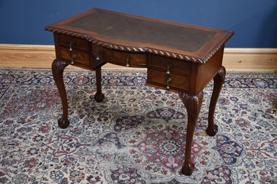 Lot 1110 - A Victorian style breakfront writing table...
