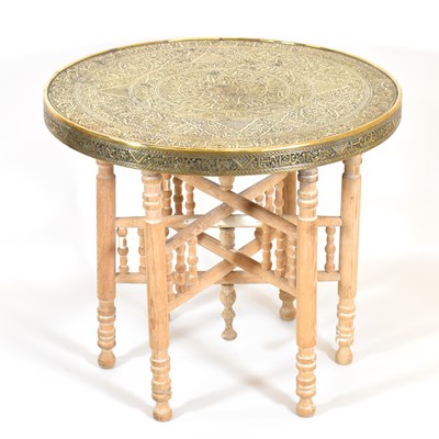 Lot 39 - An early 20th century brass tray-top table on...