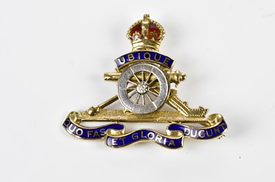 Lot 432 - A 9ct yellow and white gold enamel decorated...