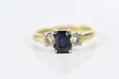 Lot 117 - An 18ct yellow gold sapphire and diamond three...