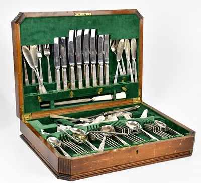 Lot 2021 - A walnut cased canteen of silver plated cutlery.