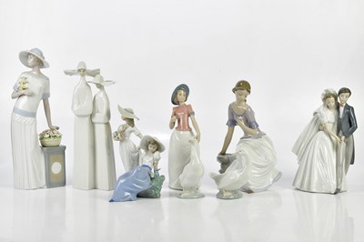 Lot 2698 - NAO; a group of nine figures including two...