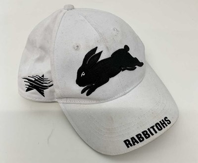 Lot 1886 - RUSSELL CROWE; a worn and signed Rabbitohs cap...