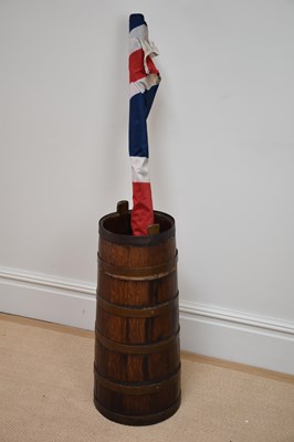 Lot 1302 - A coopered oak stick stand, height 65cm, and a...
