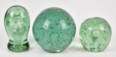 Lot 2638 - Three Victorian green glass dump weights,...