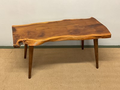 Lot 704 - A late 20th century coffee table constructed...