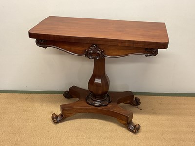 Lot 652 - A 19th century mahogany folding card table...
