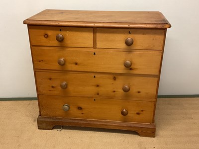 Lot 650 - An early 20th century pine chest of drawers,...