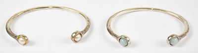 Lot 289 - GEORG JENSEN; a pair of silver torque bangles,...