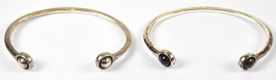 Lot 290 - GEORG JENSEN; a pair of silver torque bangles,...