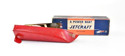Lot 893 - JETCRAFT; a tinplate power boat, in original box.