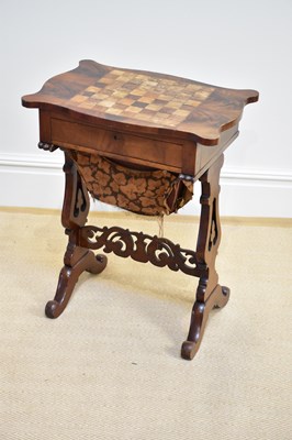 Lot 1059 - A Victorian mahogany sewing table with...