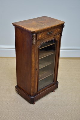 Lot 1050 - A late Victorian inlaid walnut music cabinet...