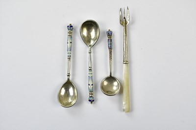 Lot 2335 - A pair of Russian silver and enamel spoons and...