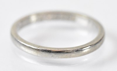 Lot 1467 - A platinum wedding band, marked 'Plat 0295' to...