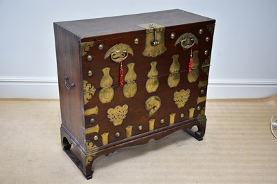 Lot 1006 - A Chinese brass applied pine and elm tonsu...