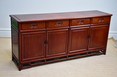 Lot 1120 - A 20th century Chinese rosewood sideboard with...