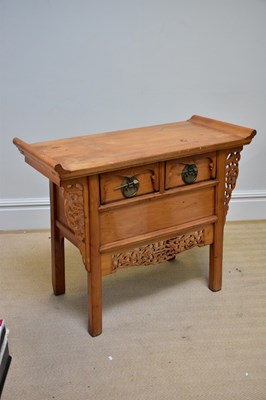 Lot 1115 - A Chinese elm side cabinet with two drawers...