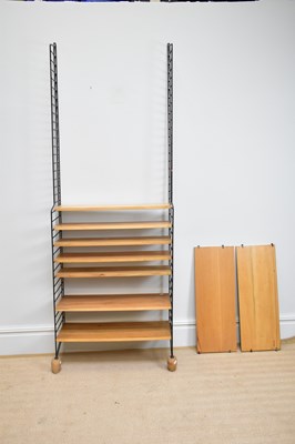 Lot 1161 - A mid century Ladderax type shelving system...